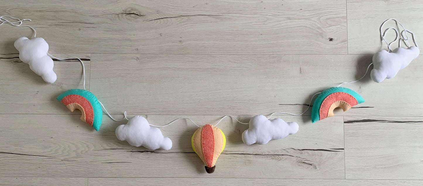 Hot air balloon and rainbow garland. Nursery decoration